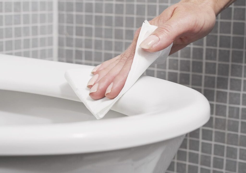 wiping COVID toilet plume off toilet seat